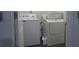 Functional laundry room with white washer and dryer, offering convenience and efficiency at 224 Coral Sunset Way, Summerville, SC 29486