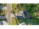 Aerial view of a home with lush greenery, a well-manicured lawn, and a private driveway at 240 Woodbrook Way, Moncks Corner, SC 29461