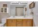 Bathroom features a double vanity, a large mirror, and tiled flooring at 240 Woodbrook Way, Moncks Corner, SC 29461