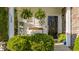Inviting front porch with ferns, a sitting bench, and a decorative star, creating a cozy entrance at 240 Woodbrook Way, Moncks Corner, SC 29461