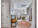 Hallway with a view to loft area, showcasing stylish decor and comfortable seating at 240 Woodbrook Way, Moncks Corner, SC 29461