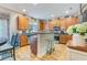 Well-lit kitchen with wood cabinets, stainless steel appliances, and a butcher block island at 240 Woodbrook Way, Moncks Corner, SC 29461