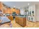 Open kitchen featuring wood cabinets, stainless steel appliances, and a kitchen island at 240 Woodbrook Way, Moncks Corner, SC 29461