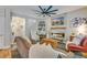 Inviting living room with a fireplace, stylish decor, and comfortable seating, creating a cozy atmosphere at 240 Woodbrook Way, Moncks Corner, SC 29461