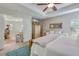 Bright and airy main bedroom with large bed, ceiling fan and walk-in closet at 240 Woodbrook Way, Moncks Corner, SC 29461