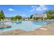 Beautiful pool area featuring a covered gazebo and lounge chairs with a lovely lake view at 240 Woodbrook Way, Moncks Corner, SC 29461