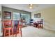 Entertaining bar area with a counter, bar stools, a TV, and shelving, ideal for hosting guests at 249 Old Savannah Dr, Goose Creek, SC 29445