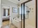 The bathroom has a large soaking tub and a separate glass shower at 249 Old Savannah Dr, Goose Creek, SC 29445