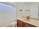 Bathroom with a shower, toilet, and vanity with modern countertop and sink fixtures at 249 Old Savannah Dr, Goose Creek, SC 29445