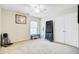 Bright bedroom featuring neutral carpet, a ceiling fan, and a double door closet, creating a relaxing space at 249 Old Savannah Dr, Goose Creek, SC 29445