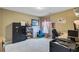 Bedroom featuring neutral carpet, ample closet space, and a window with natural light at 249 Old Savannah Dr, Goose Creek, SC 29445