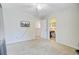 Comfortable bedroom with a ceiling fan and access to a vanity area; TV on the wall at 249 Old Savannah Dr, Goose Creek, SC 29445