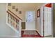 Inviting foyer featuring beautiful wood floors, staircase, and a decorative front door at 249 Old Savannah Dr, Goose Creek, SC 29445
