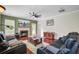 Comfortable living room with plush seating, a fireplace, and abundant natural light at 249 Old Savannah Dr, Goose Creek, SC 29445