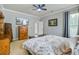 The main bedroom features neutral paint, a ceiling fan, and a dresser at 249 Old Savannah Dr, Goose Creek, SC 29445