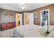 Comfortable main bedroom with wood furniture and a door leading to a bathroom at 249 Old Savannah Dr, Goose Creek, SC 29445