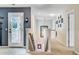 Bright upstairs hallway with neutral carpet, white trim, and a view to the lower level at 249 Old Savannah Dr, Goose Creek, SC 29445