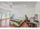 A bedroom with a bed, ceiling fan, and french doors to the backyard at 2736 Shadow Ln, North Charleston, SC 29406
