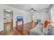 Bright living room with hardwood floors and neutral walls, creating a warm and inviting atmosphere at 2736 Shadow Ln, North Charleston, SC 29406