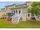 Charming backyard featuring a well-maintained lawn, and multiple access doors at 2948 Treadwell Street St, Mount Pleasant, SC 29466