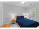 Well-lit bedroom featuring hardwood floors, matching nightstands and a window view at 2948 Treadwell Street St, Mount Pleasant, SC 29466