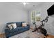 Versatile room perfect for an exercise area with workout equipment and a comfortable seating area at 2948 Treadwell Street St, Mount Pleasant, SC 29466