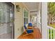 Inviting front porch with cozy seating, perfect for relaxing and enjoying neighborhood views at 2948 Treadwell Street St, Mount Pleasant, SC 29466