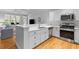 Modern kitchen with stainless steel appliances, quartz countertops, and open layout great for entertaining at 2948 Treadwell Street St, Mount Pleasant, SC 29466
