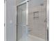 Bathroom shower features glass doors, tiled walls, and a built-in bench at 2948 Treadwell Street St, Mount Pleasant, SC 29466