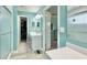Well-lit bathroom with double sinks, a walk-in shower, and a separate room for the toilet at 302 Axeminster Ct, Goose Creek, SC 29445