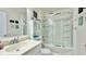 Clean and bright bathroom featuring a shower-tub combo and a vanity with storage at 302 Axeminster Ct, Goose Creek, SC 29445