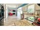 Open kitchen featuring granite countertops and stainless steel appliances with great flow to the living room at 302 Axeminster Ct, Goose Creek, SC 29445