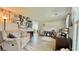 Comfortable living room with stylish decor, neutral tones, and inviting atmosphere, perfect for relaxing and entertaining guests at 302 Axeminster Ct, Goose Creek, SC 29445