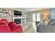 Inviting living room with a fireplace and a sliding glass door with access to a patio or deck at 302 Axeminster Ct, Goose Creek, SC 29445