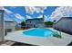 Backyard featuring an in-ground pool, perfect for enjoying sunny days and outdoor entertaining in this residential haven at 302 Axeminster Ct, Goose Creek, SC 29445