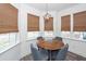Eat in kitchen features breakfast table for four and natural light at 305 Flowering Peach Ct # 202, Charleston, SC 29414