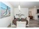 Inviting dining room featuring a round table, stylish chairs, and elegant decor at 305 Flowering Peach Ct # 202, Charleston, SC 29414