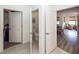 Hallway features a view into the bathroom and bedroom with lovely wood floors and lots of natural light at 305 Flowering Peach Ct # 202, Charleston, SC 29414