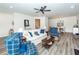 Spacious living room with ample seating, modern decor, and stylish flooring perfect for entertaining at 305 Flowering Peach Ct # 202, Charleston, SC 29414