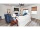 Cozy living room with a fireplace, white sofa, and nautical-themed decor at 305 Flowering Peach Ct # 202, Charleston, SC 29414