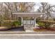 Community mailboxes beneath a white roof structure surrounded by nice shrubbery at 305 Flowering Peach Ct # 202, Charleston, SC 29414