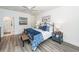 Serene main bedroom with a wrought iron bed frame and relaxing color palette at 305 Flowering Peach Ct # 202, Charleston, SC 29414
