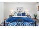 Comfortable main bedroom featuring a queen bed with nautical-themed decor at 305 Flowering Peach Ct # 202, Charleston, SC 29414