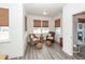 Bright sunroom with comfortable wicker chairs, offering a relaxing retreat at 305 Flowering Peach Ct # 202, Charleston, SC 29414