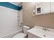 Standard bathroom featuring a shower/tub combo, tile surround, and single sink vanity at 313 Houston Dr, Ladson, SC 29456