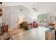 Inviting living room with vaulted ceiling, natural light and contemporary wood-look floors at 313 Houston Dr, Ladson, SC 29456