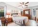 Spacious main bedroom featuring hardwood floors, neutral paint, and a ceiling fan at 313 Houston Dr, Ladson, SC 29456