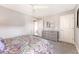 Comfortable bedroom with a paisley bedspread, a dresser, and soft carpet flooring, ideal for relaxation at 3173 Hugh Bennett Dr, Johns Island, SC 29455