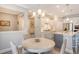 Open-concept breakfast nook is conveniently located near the kitchen and stainless steel appliances at 3173 Hugh Bennett Dr, Johns Island, SC 29455