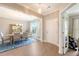 Elegant dining room featuring hardwood floors, a chandelier, and a decorative mirror at 3173 Hugh Bennett Dr, Johns Island, SC 29455
